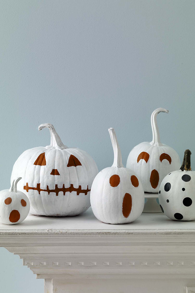These painted pumpkins because they are funny and simple! They used white paint as the base and then added easy brown and black shapes for surprised or scary faces on the white pumpkin. It’s a great idea for decorating with kids!