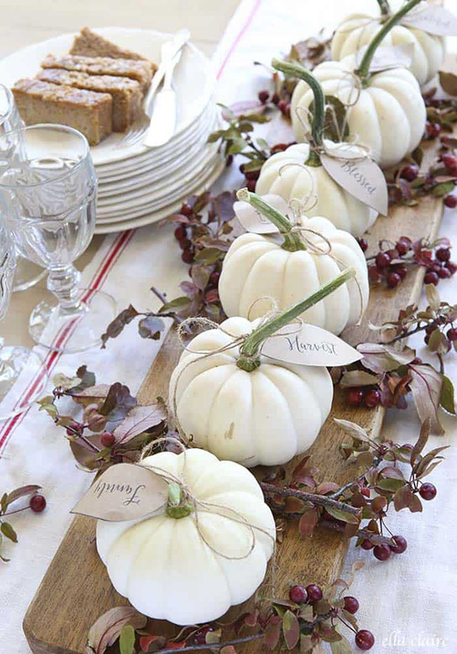 This is a truly heartwarming idea for a Thanksgiving table. Placing a small white pumpkin at each place setting with a tag that has a word like 