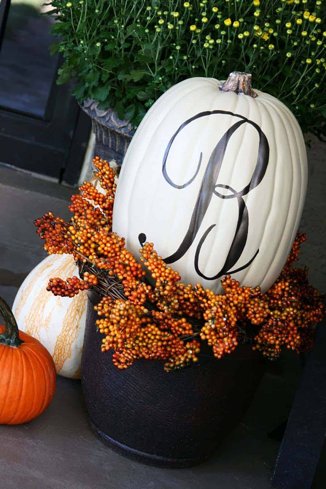 This is a great idea for a porch! The big white pumpkin with the fancy initial 