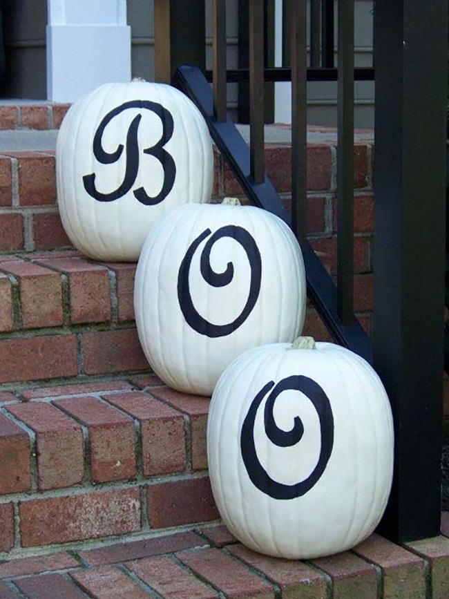 These three white pumpkins spell out the word 