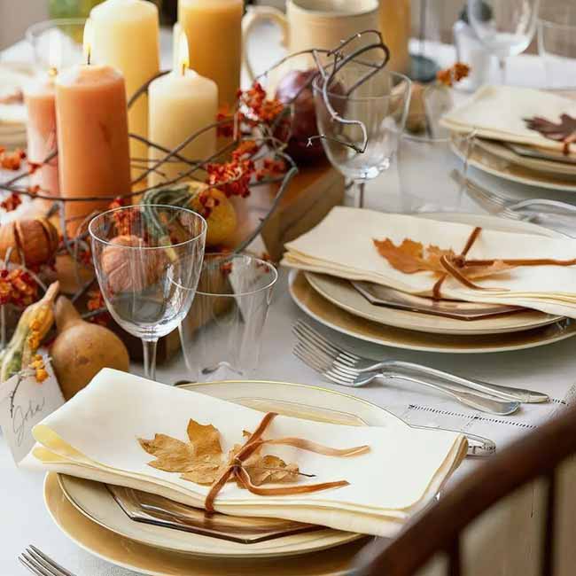 Tying a real fall leaf onto each napkin is such a simple touch. It makes the whole table feel special and connected to the season.