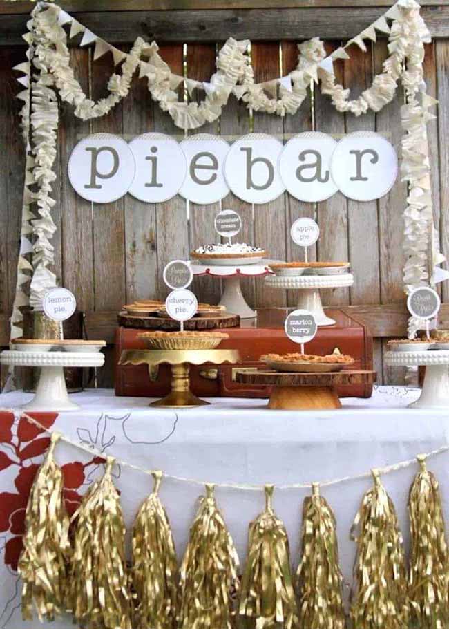 A pie bar is an amazing idea for a fall party dessert table! It looks so charming and gives everyone a chance to try a slice of their favorite kind.