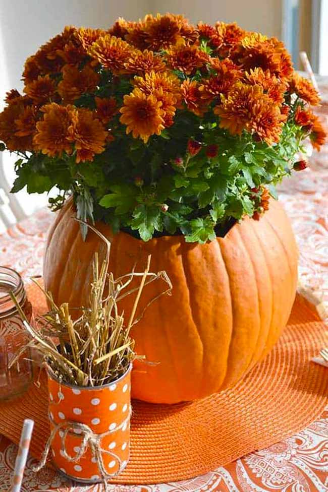 Hollowing out a pumpkin to use as a vase for flowers is a classic fall decorating trick for a reason! It's so simple to do and always looks fantastic.