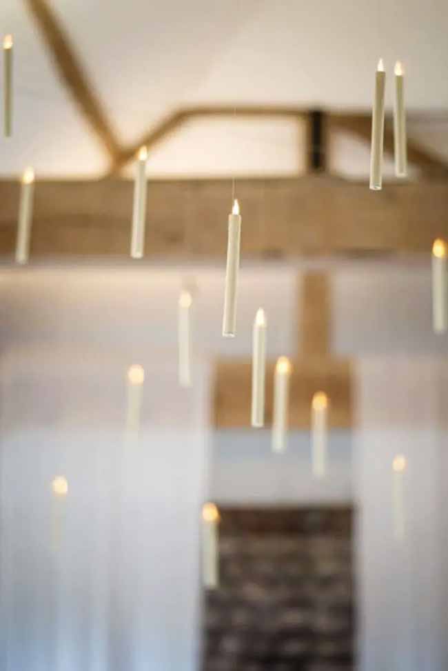 More floating candles! This is always a magical idea for Halloween. Hanging them from the wooden beams gives it a great rustic, wizard-y feel.