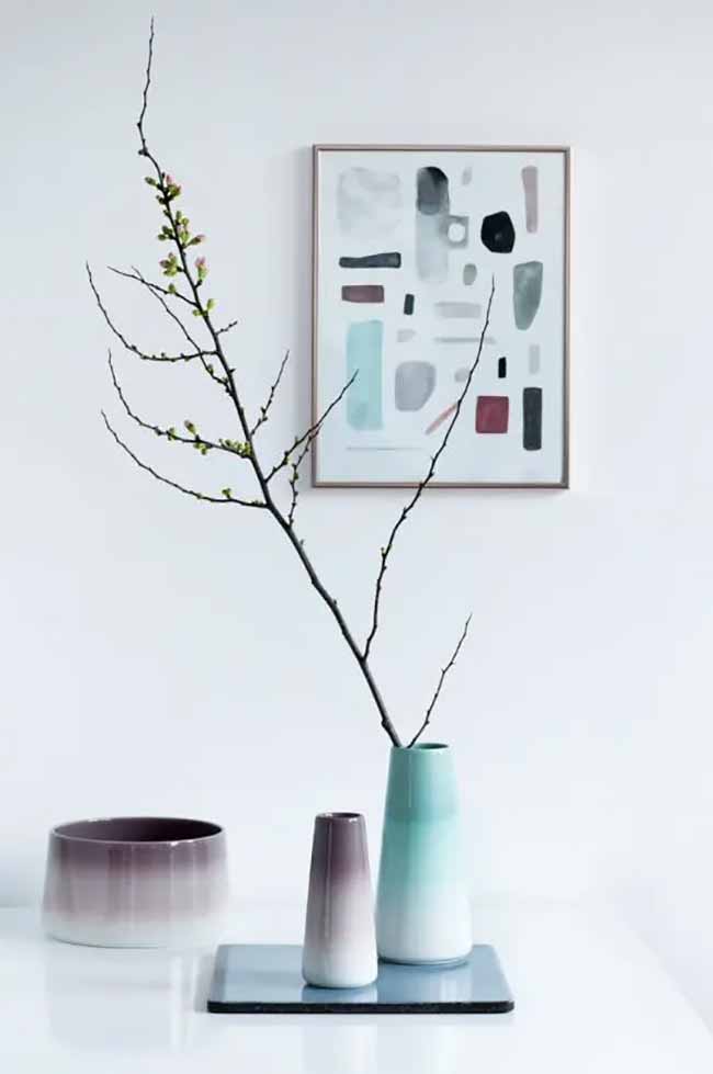 Vase Color Pop. The light colors that fade into darker shades on these vases are really nice to look at. A thin, budding branch is all they need to look elegant and fresh.